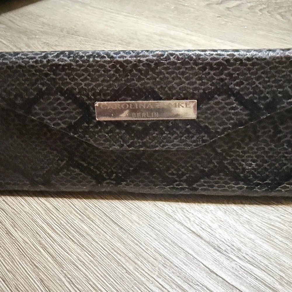 Carolina Lemke Berlin Black Snakeskin Sunglasses case